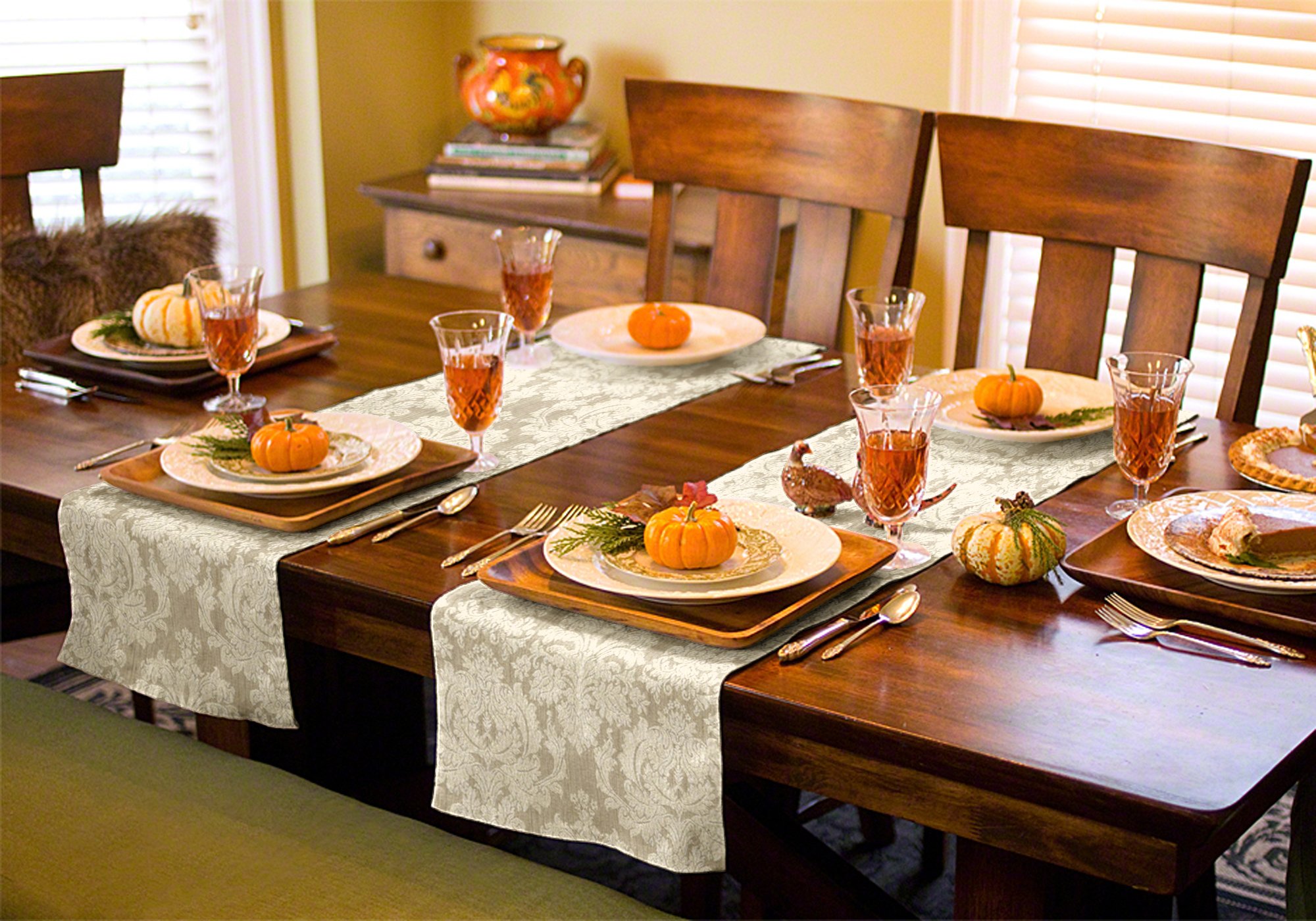 Seasonal table runners can be used in a variety of ways. Use one down the length of your table, or use a pair across the width of your dining table to create a sophisticated scene.