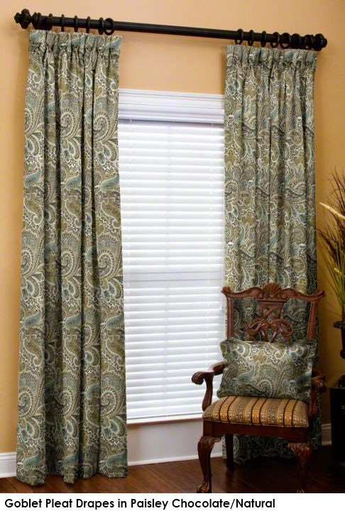 Drapes in paisley green fabric