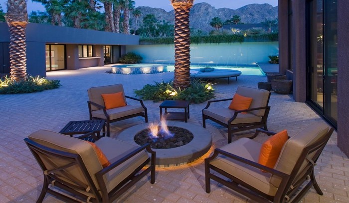 Aim to entertain: Make sure there is enough seating with deep seating chair cushions with throw pillows on the patio.